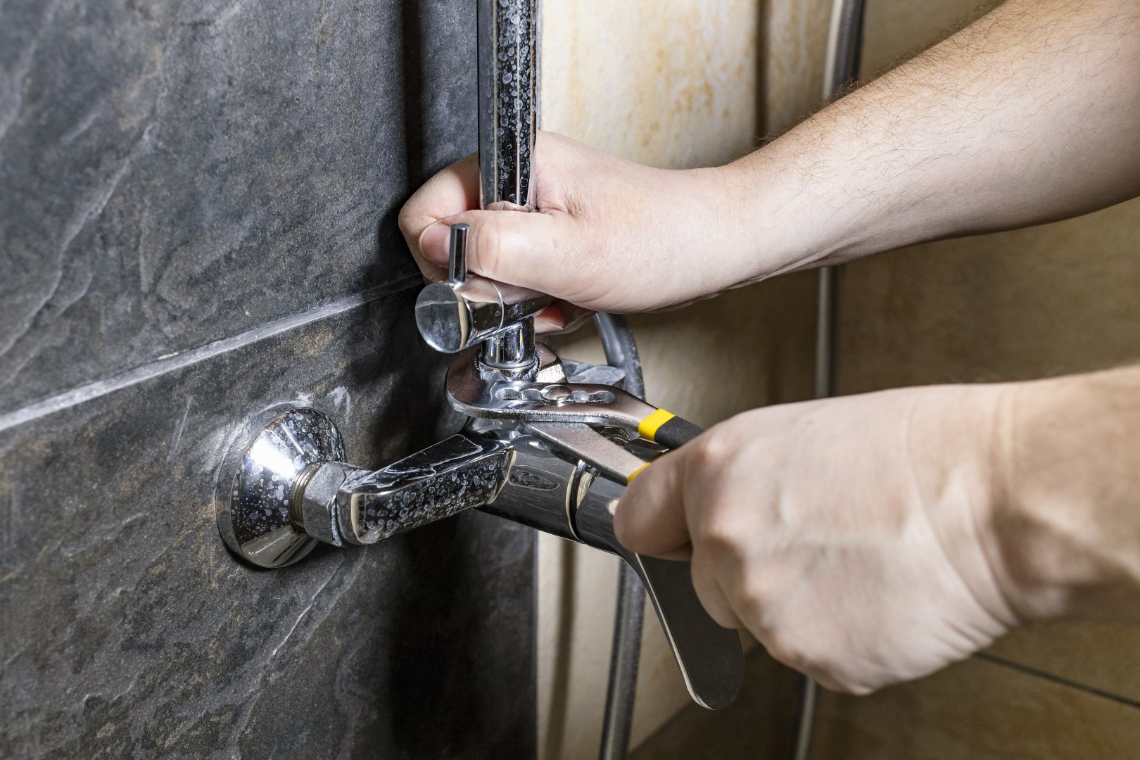 plumber fixing a faucet with wrench 2026 03 09 08 42 17 utc Large